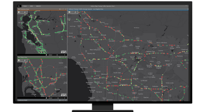 A graphic of a computer monitor displaying road routes in gray, red, and green