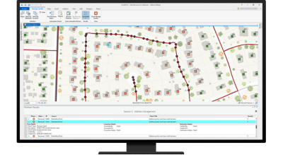 Desktop computer showing houses and streets