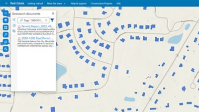 A Microsoft SharePoint interface displaying a map of a neighborhood with structures highlighted in blue and a search pane overlaid to the left 