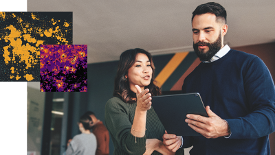 two gis professionals share a tablet and collaborate