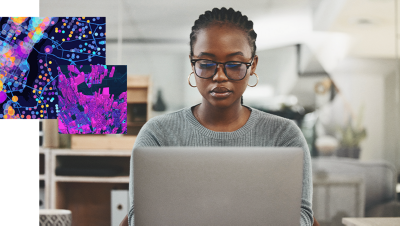 a gis professional works on a map on a laptop