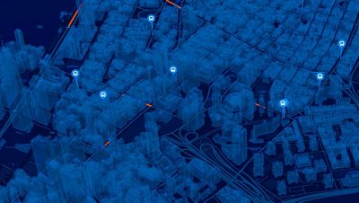 Abstract blue 3D city visualization resembling a digital twin with glowing data points highlighting buildings and streets