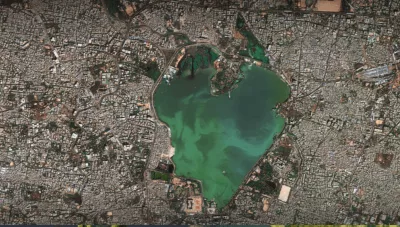 A stylized map of Edinburgh, Scotland, showing buildings and terrain alongside cartography tools in ArcGIS Pro