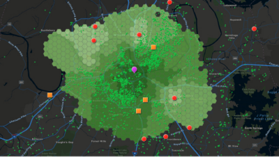 Dark gray map with large green area and multi-colored dots