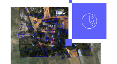 An aerial view showcasing a mapped area with grid overlays and directional markers.