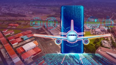 Montaje de un avión digital saliendo de un celular sobre una vista aérea de un aeropuerto.