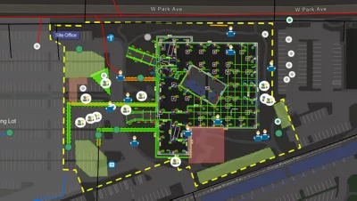 Mappa interna di un edificio per uffici con delimitazioni interne, caratteristiche e percorsi evidenziati e segnalati