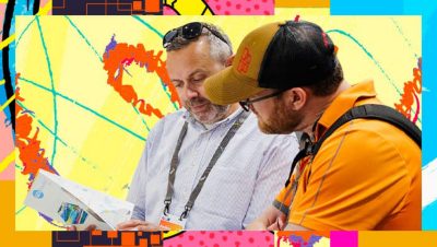 Event attendees studying a brochure paired with colorful abstract graphics