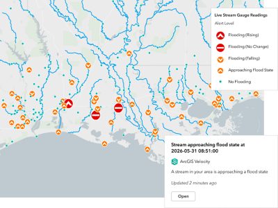 An alert notification showing a stream approaching flood stage with status indicators such as rising, falling, or no flooding