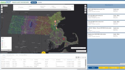 The default view of the Waze Alert dashboard set to Real-Time, displaying Waze reported alerts across the six MassDOT districts. The dashboard features a map highlighting important alerts in each district.