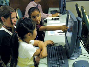 young students learning about GIS