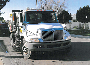 photo of a street sweeper truck