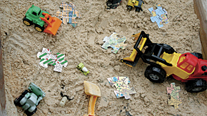 photo of toys in a sandbox