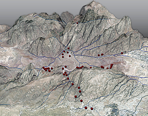 Oblique view of Petra with the Bedouin village of Umm Sayhoun (upper right) and the adjacent city of Wadi Musa (lower right).