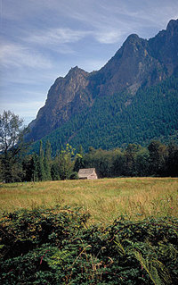photo of a meadow and mountains