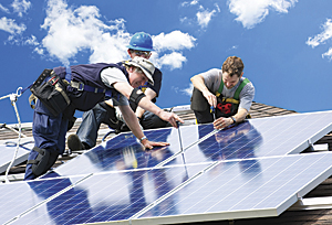 Installing solar panels on a Los Angeles rooftop.