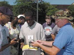 CEITA instructor Gary Roth shows mappers a GPS receiver