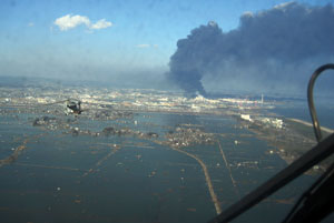 US Naval helicopters deliver food, donated by the city of Ebina, Japan, to survivors of the earthquake and tsunami.
