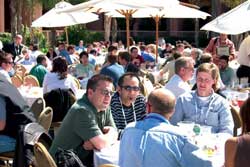 conference attendeed outside by the pool