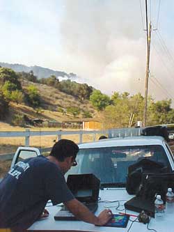 GIS team setting up at a new fire line