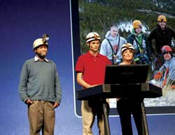 photo of Tia Bakker and Ernie Cottle describing their work during the Plenary Session