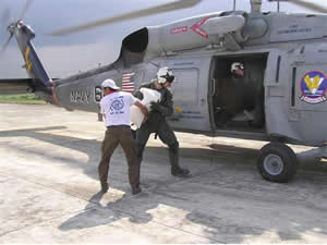 photo of helicopter delivering supplies